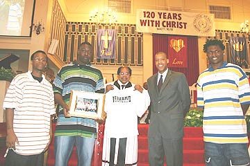 BCC Basketball team with Rev. Wells