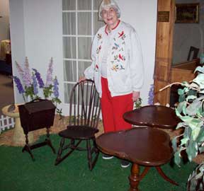 Mary Mace and the antiques.