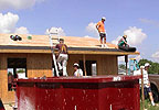 Habitat for Humanity builds a house.