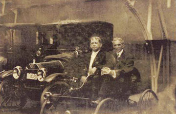 L.C. Oliver and Henry Ford in car.