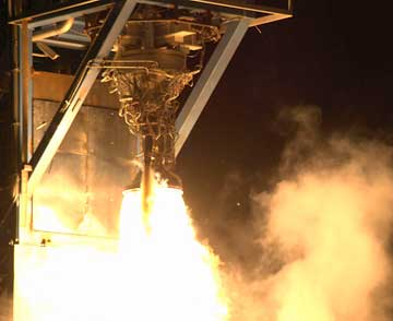SpaceX Merlin Vacuum second stage engine undergoing a mission-length test firing.