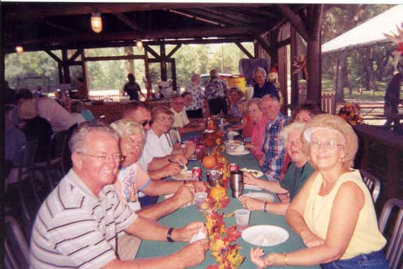 Folks Enjoying the Company & Food