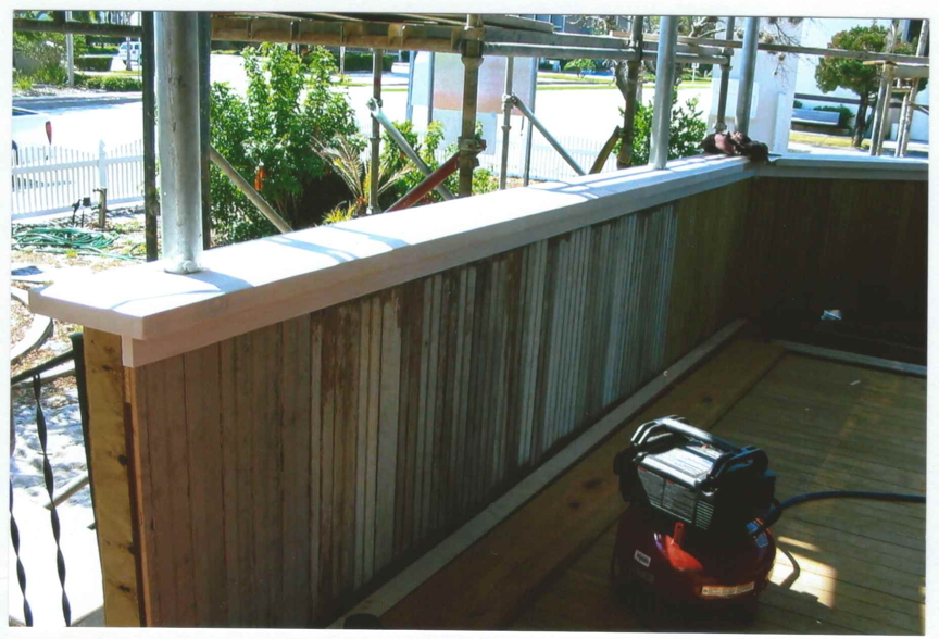 Downstairs porch before refinishing. Downstairs porch before refinishing.