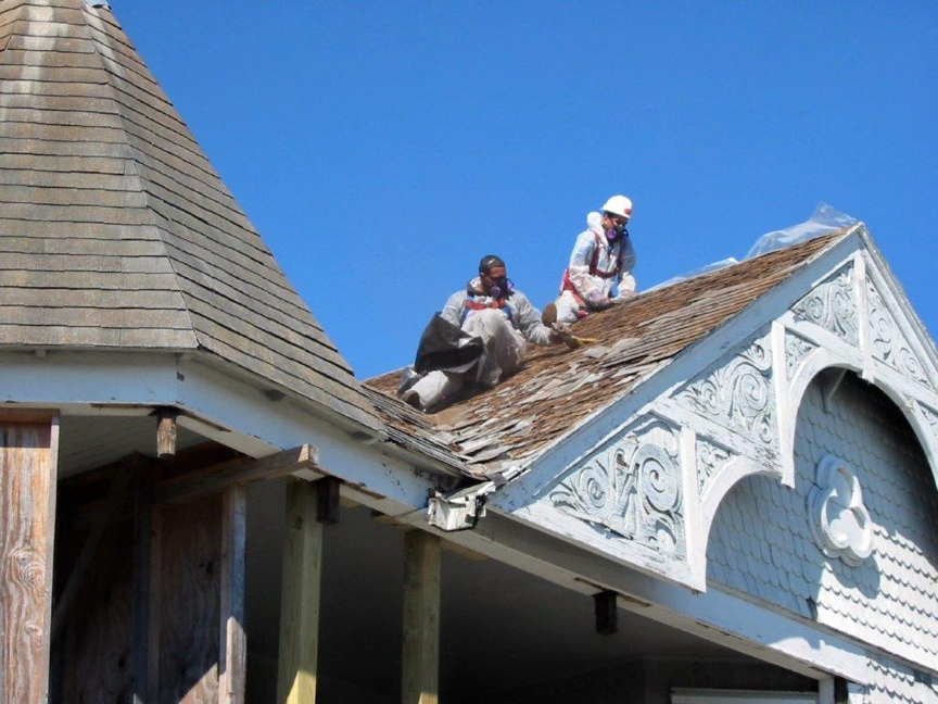Men working on the roof of the Pritchard House.