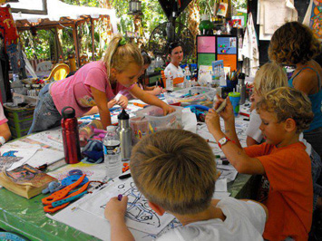 Kids working on the art table